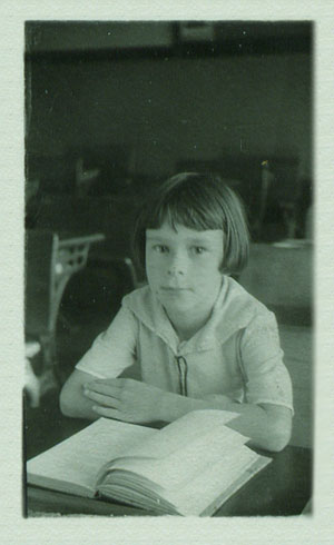 A school photo of a young Emily McGrath in 1934